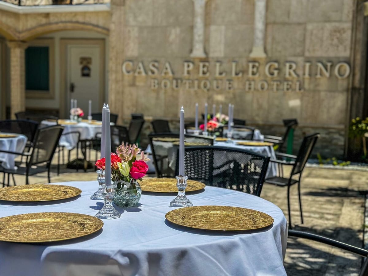 A set table in the courtyard at Hollywood Beach Hotels