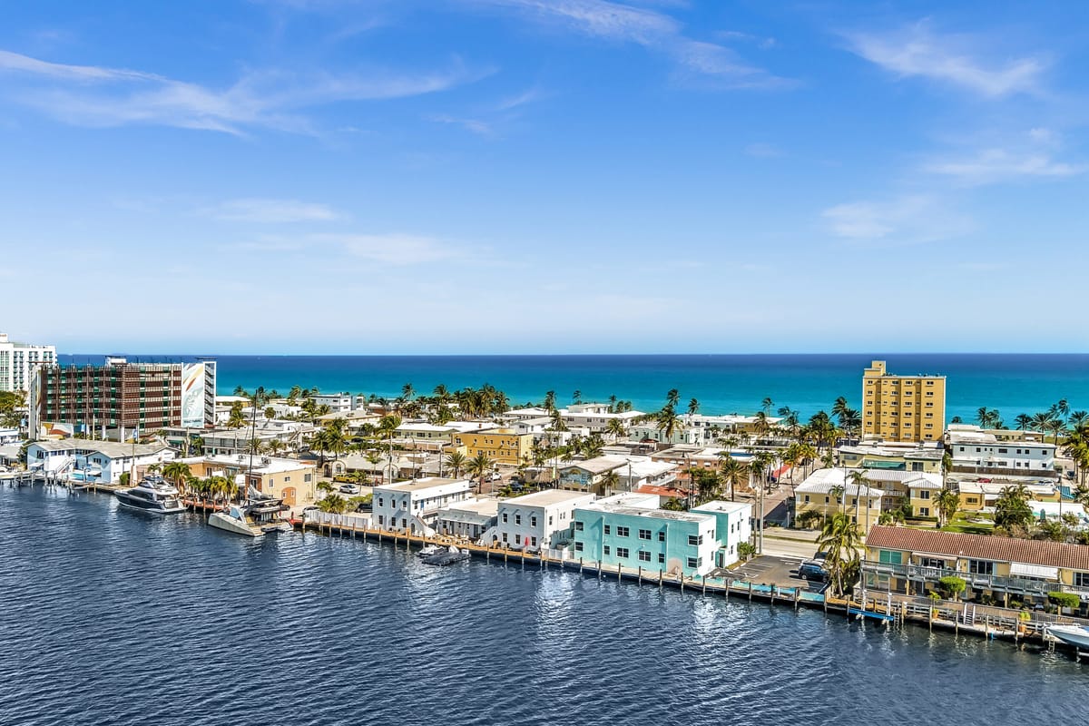 Aerial view of the Hollywood Beach Hotels buildings and the ocean at the edge of the sand